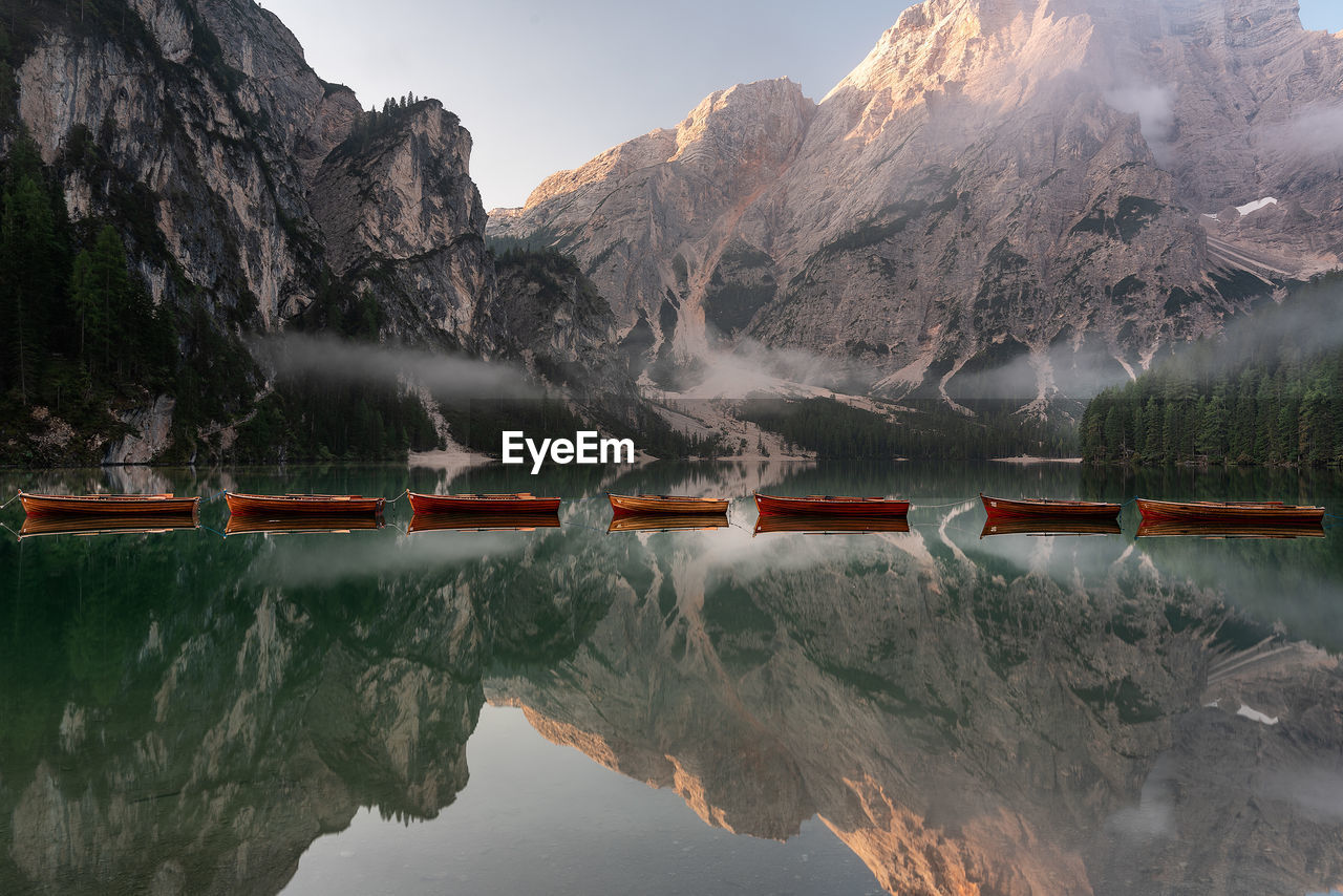 Scenic view of lake and snowcapped mountains