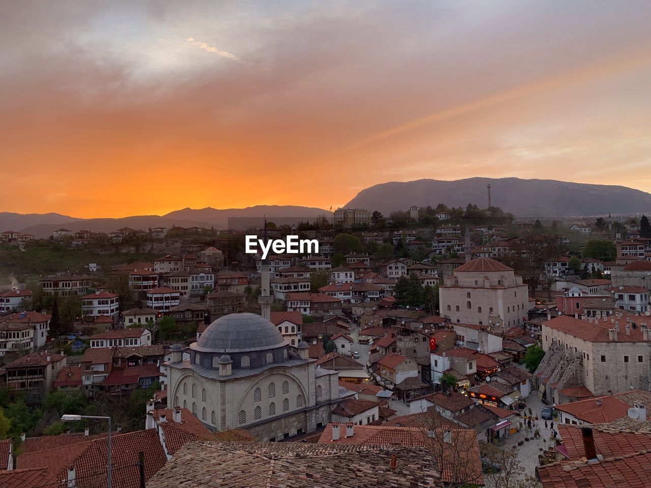 High angle view of townscape against sky at sunset