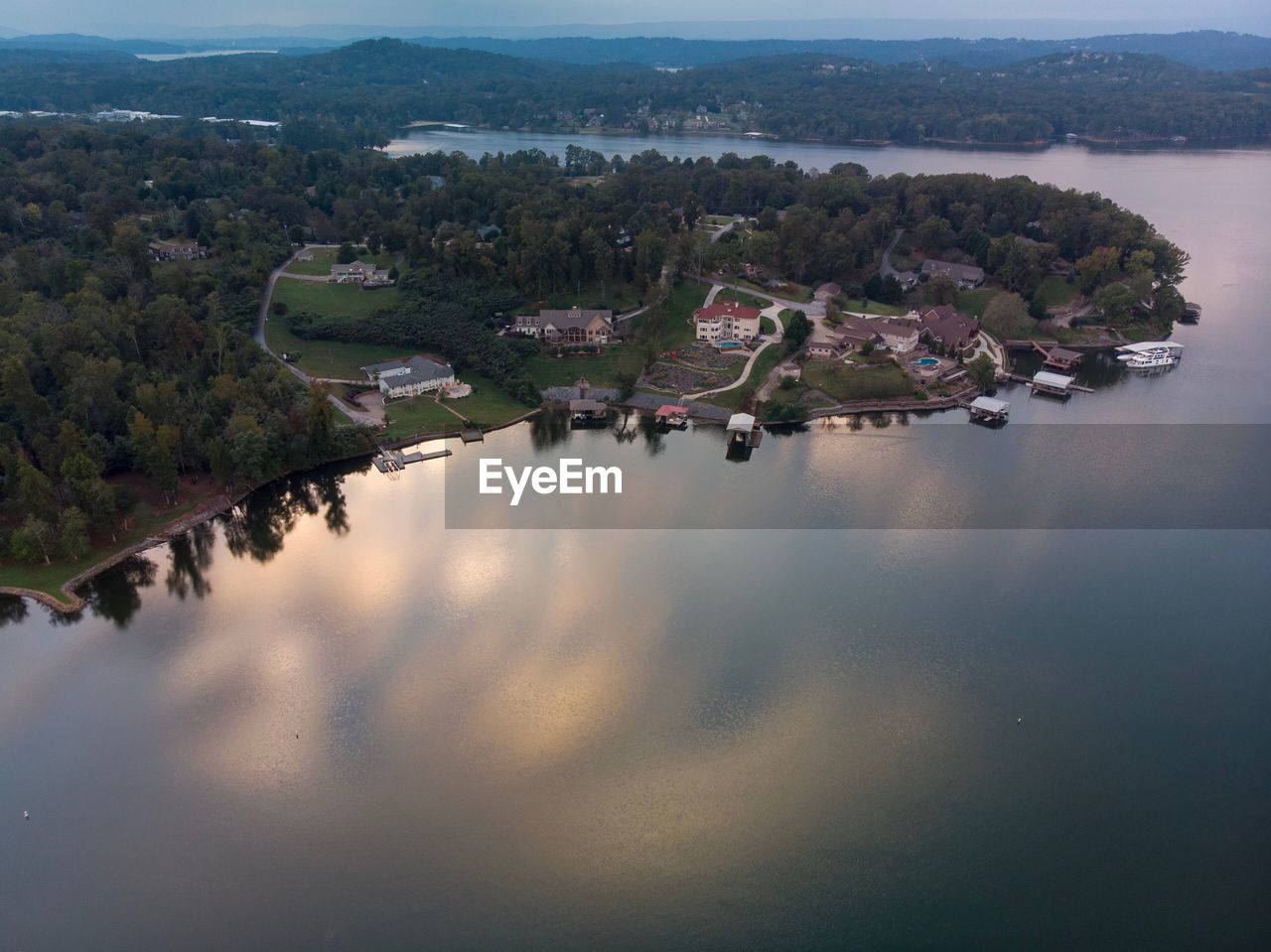 High angle view of buildings by lake