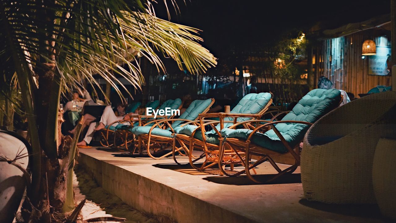 VIEW OF CHAIRS AT NIGHT