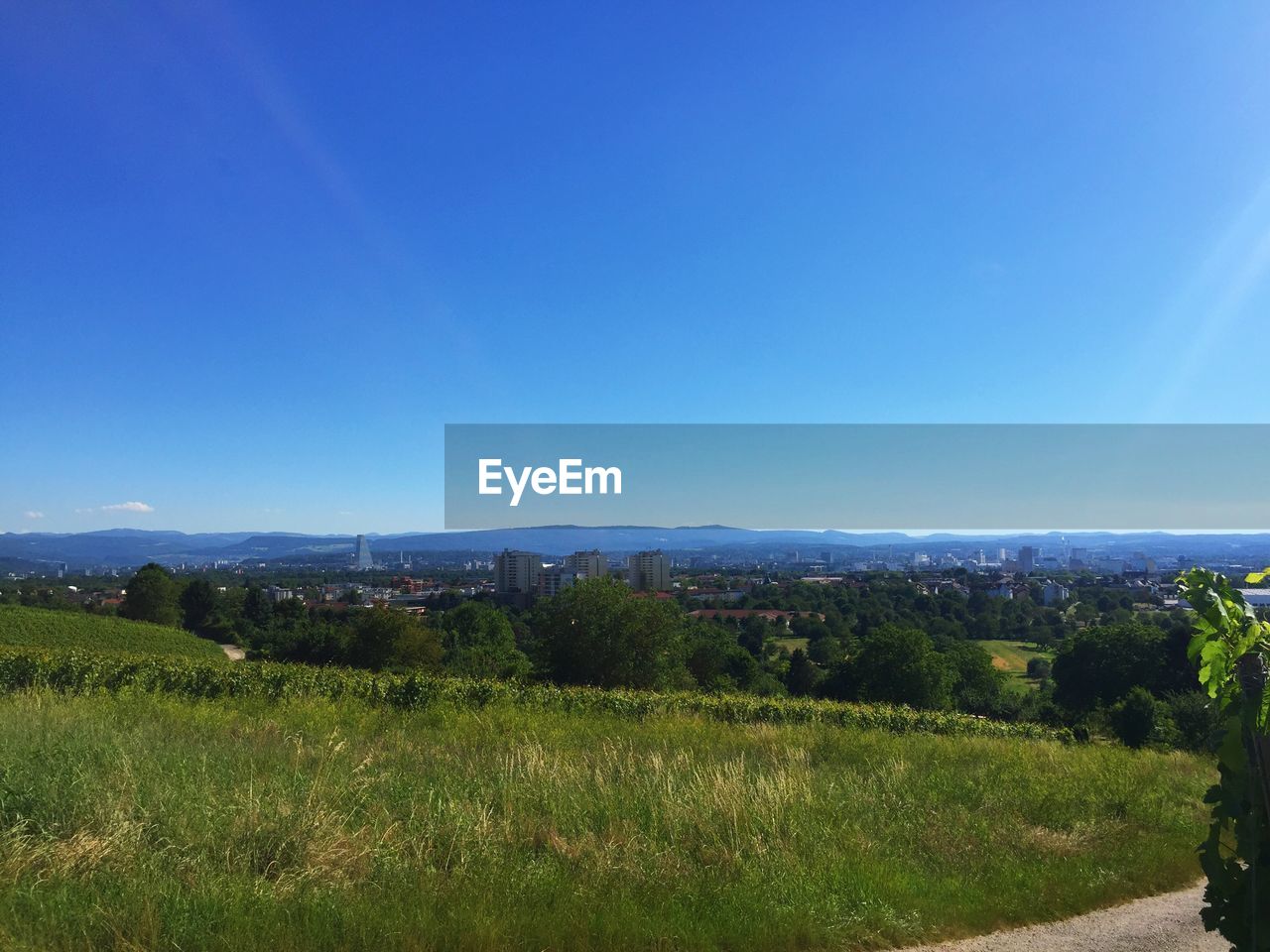 SCENIC VIEW OF LANDSCAPE AGAINST BLUE SKY