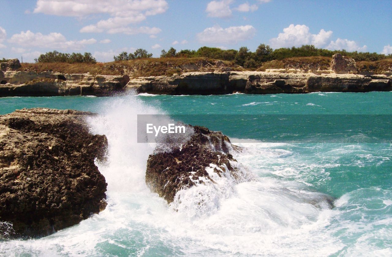 SCENIC VIEW OF WATERFALL