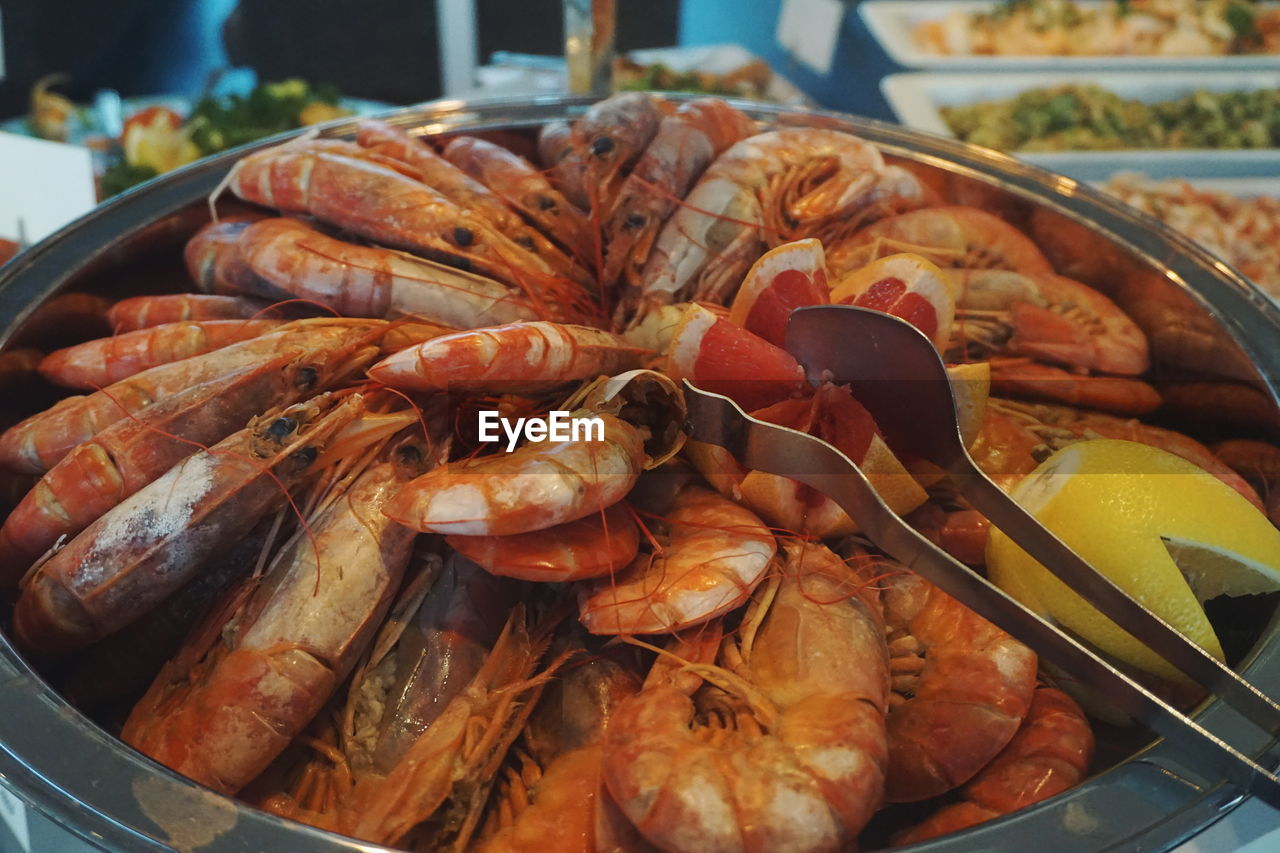 Close-up of prawns in container