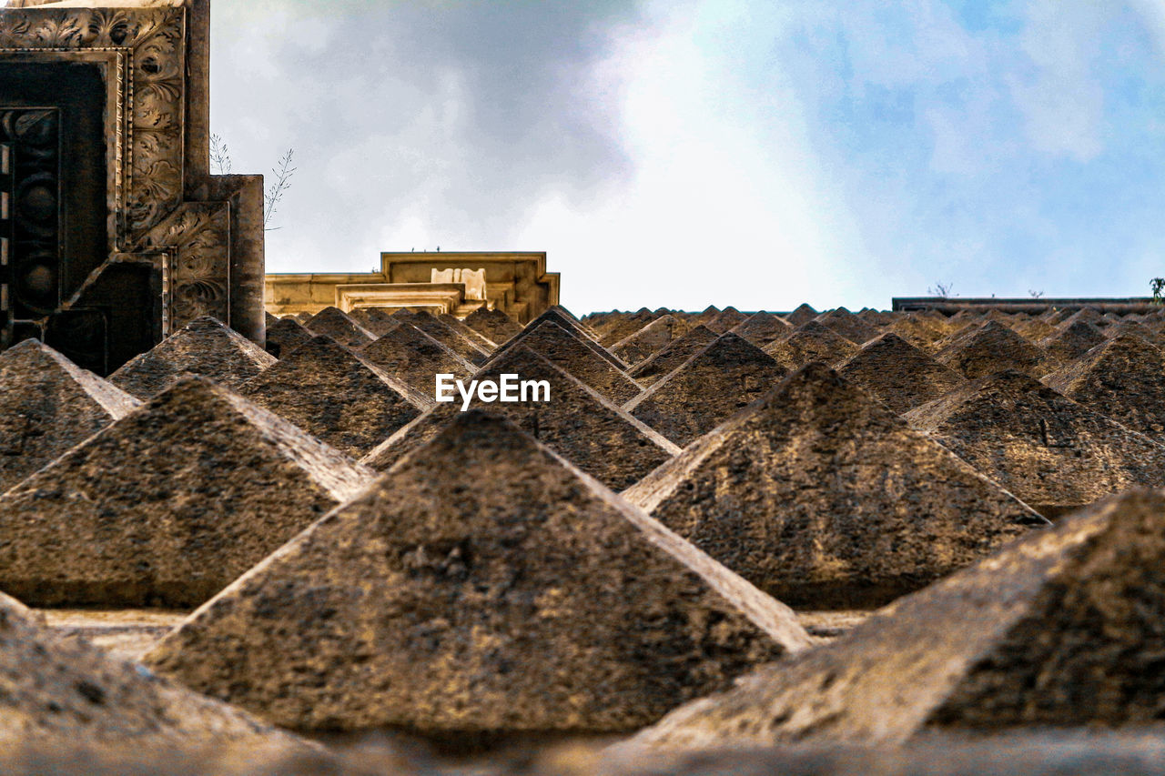 Low angle view of old building against sky