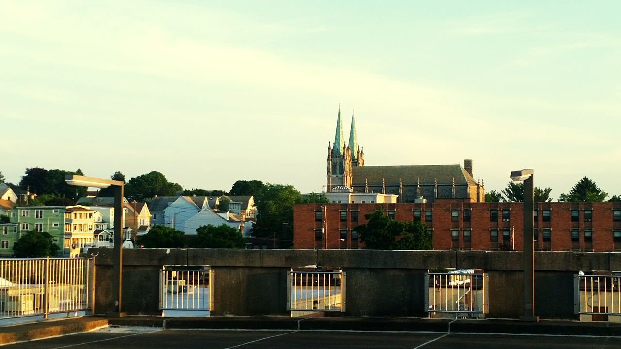 BUILDINGS IN CITY AGAINST SKY