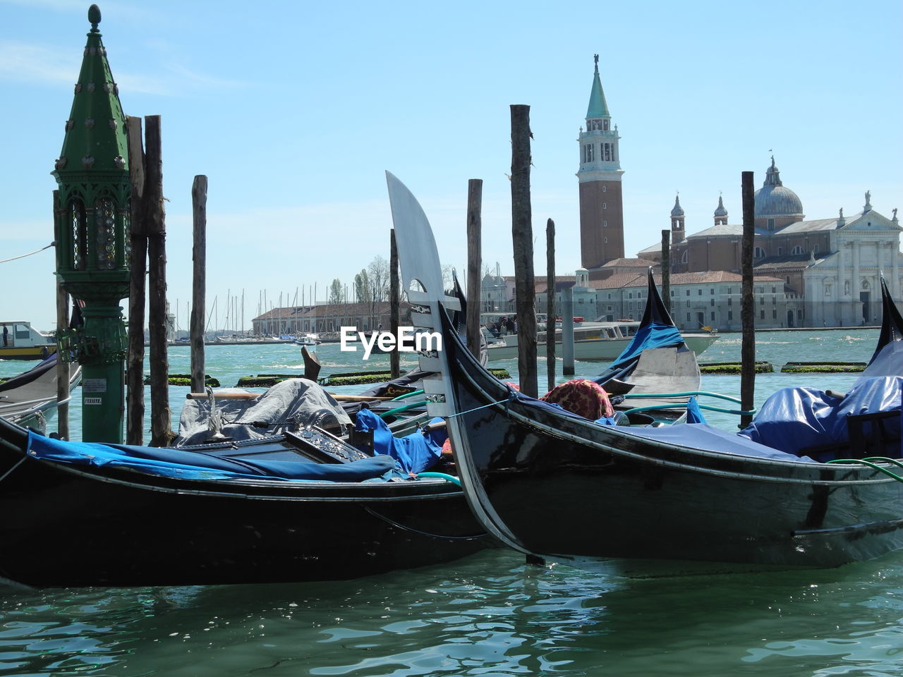 Boats moored at harbor