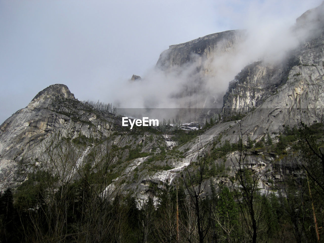 Scenic view of rocky mountains against sky