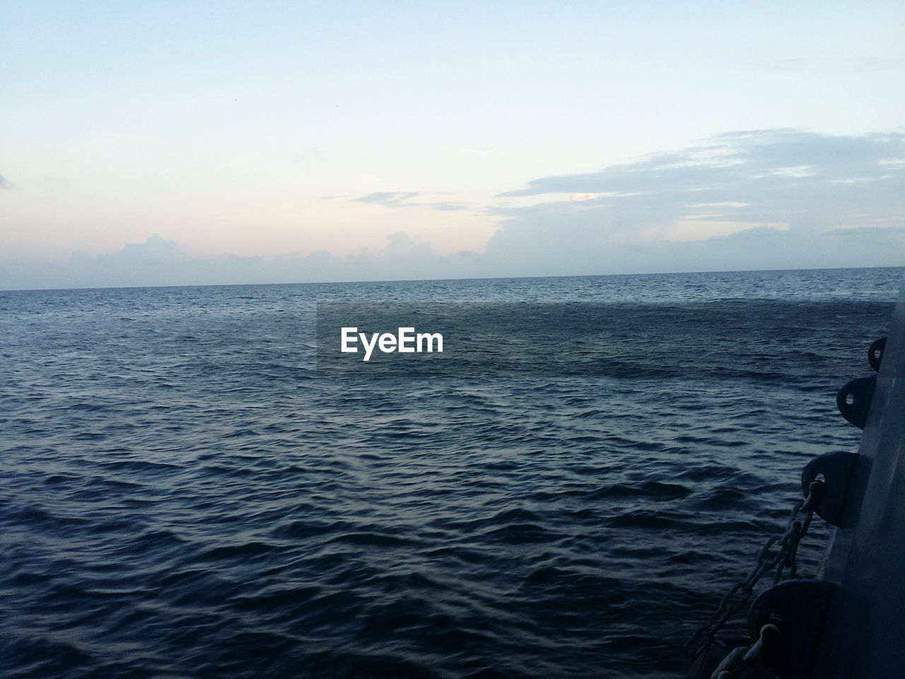 SCENIC VIEW OF SEASCAPE AGAINST SKY