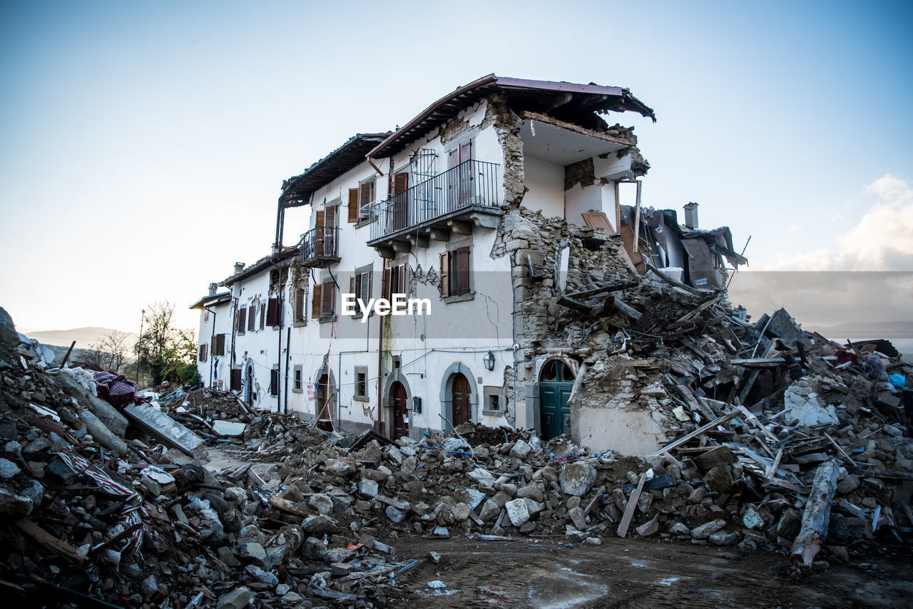 DAMAGED BUILDING AGAINST SKY