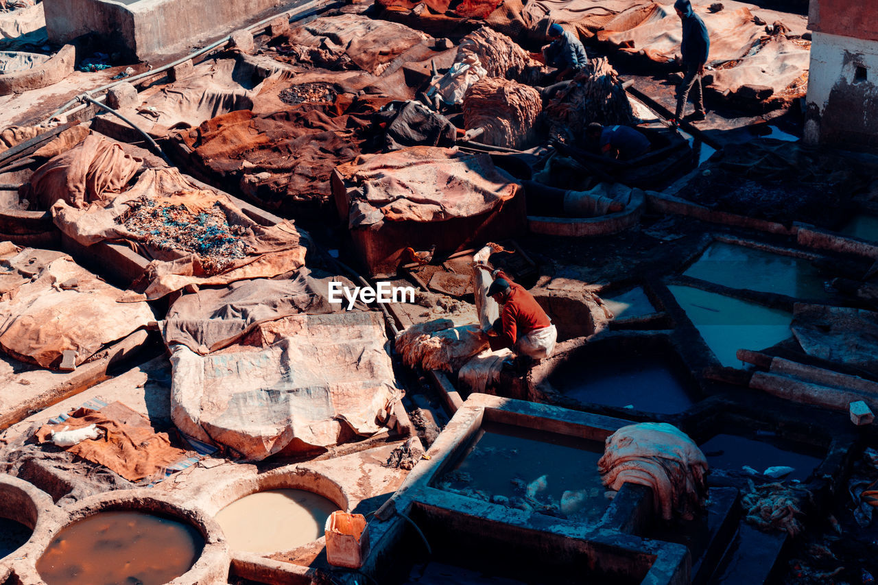 High angle view of man washing clothes outdoors