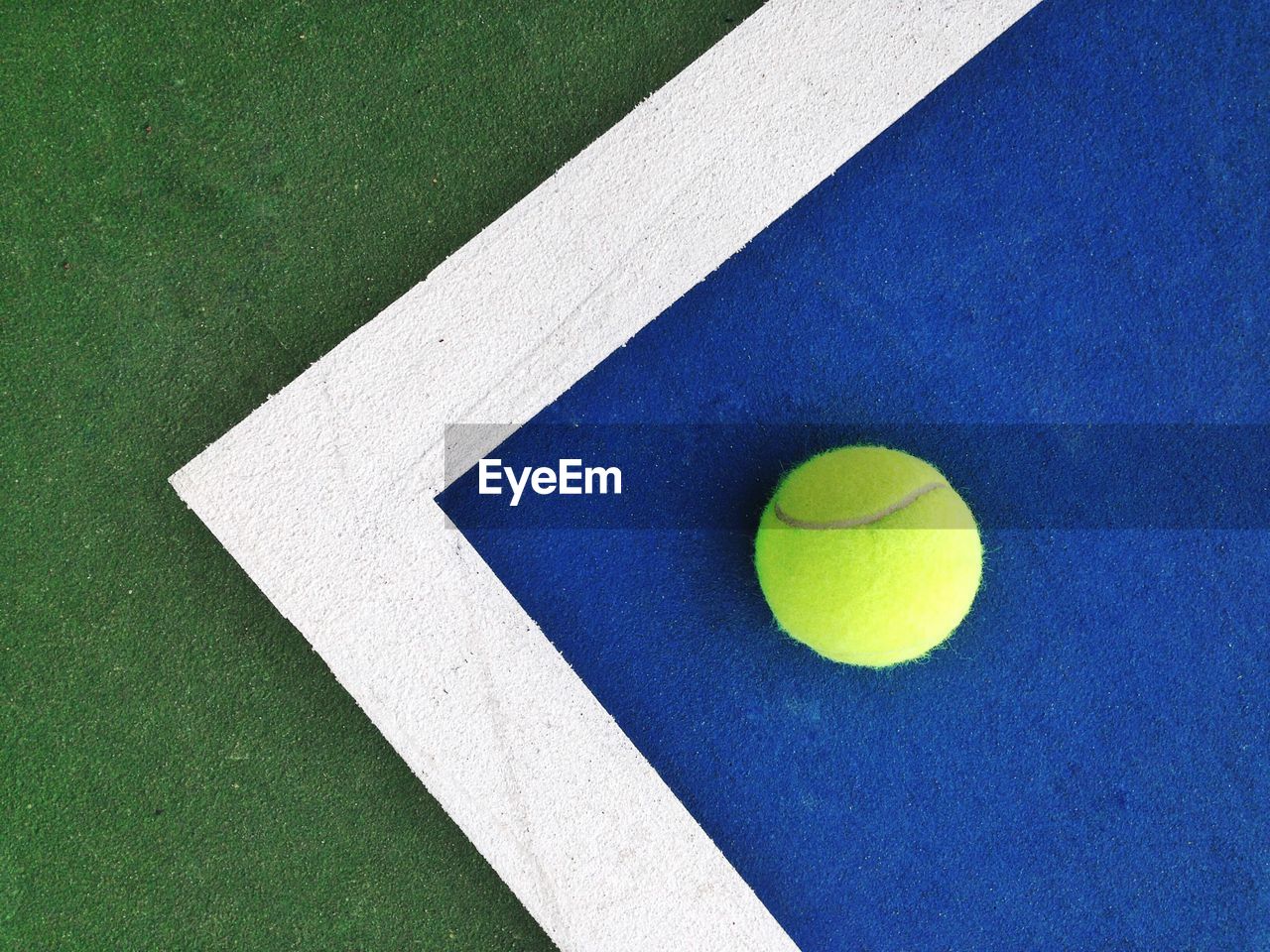 Directly above shot of tennis ball on court