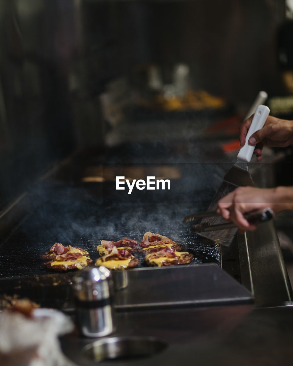 PERSON PREPARING FOOD