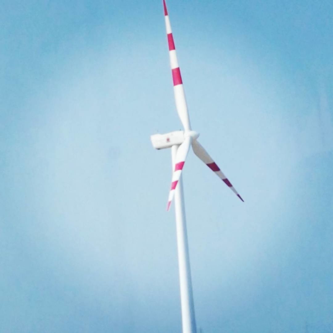 LOW ANGLE VIEW OF WINDMILL