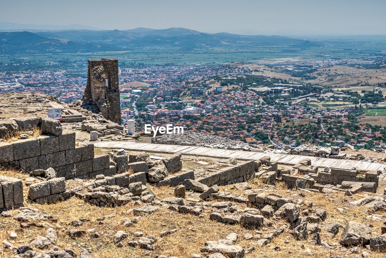 HIGH ANGLE VIEW OF CITY BUILDINGS AGAINST SKY