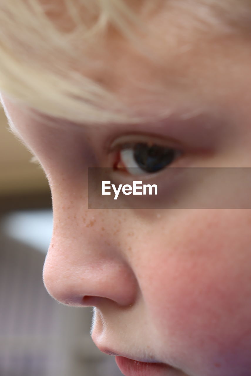 CLOSE-UP PORTRAIT OF BOY WITH EYES