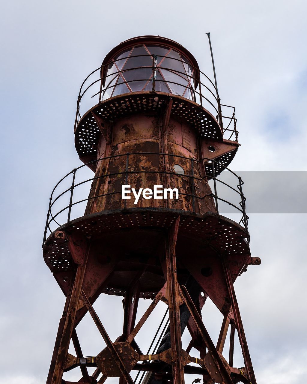 Low angle view of water tower against sky