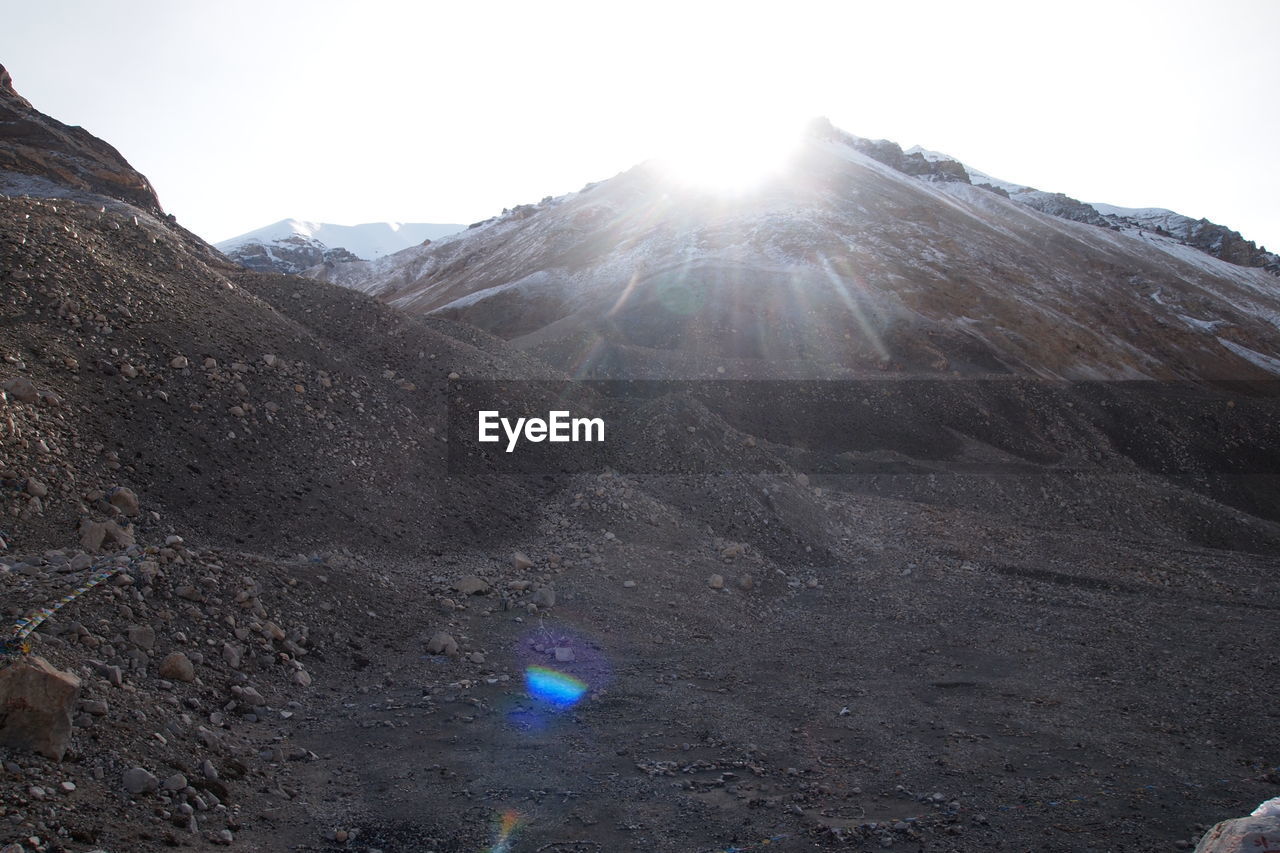 The sun shining on mount everest, from the first basecamp, tibetan side 