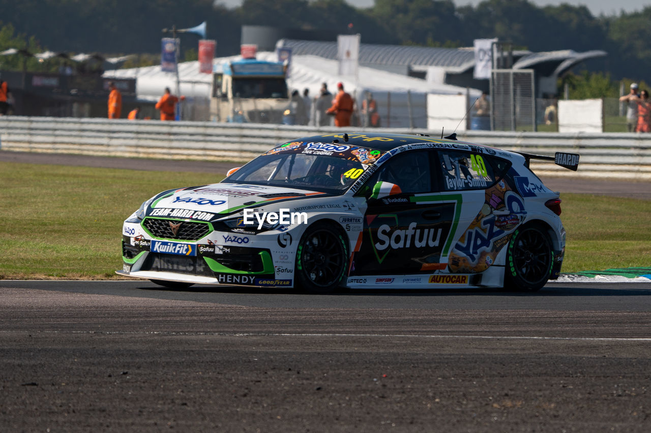 rallycross, transportation, mode of transportation, car, sports, auto racing, racing, automobile, motor vehicle, motorsport, touring car, race track, world rally car, vehicle, race car, race, road, sports car, land vehicle, architecture, rallying, sports race, stock car racing, competition, track and field event, family car, sports track, driving, motor racing track, outdoors, day