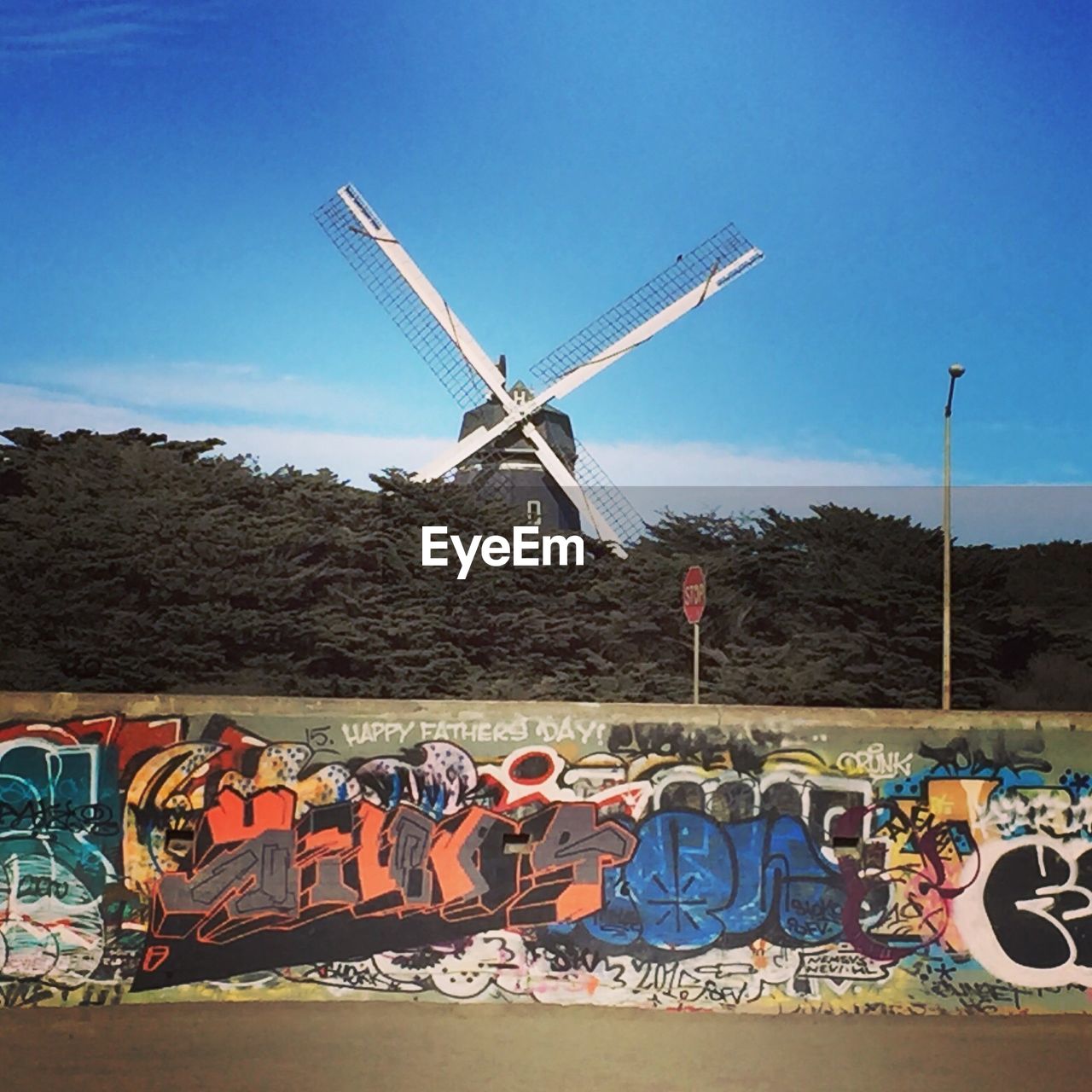 TRADITIONAL WINDMILL ON LANDSCAPE