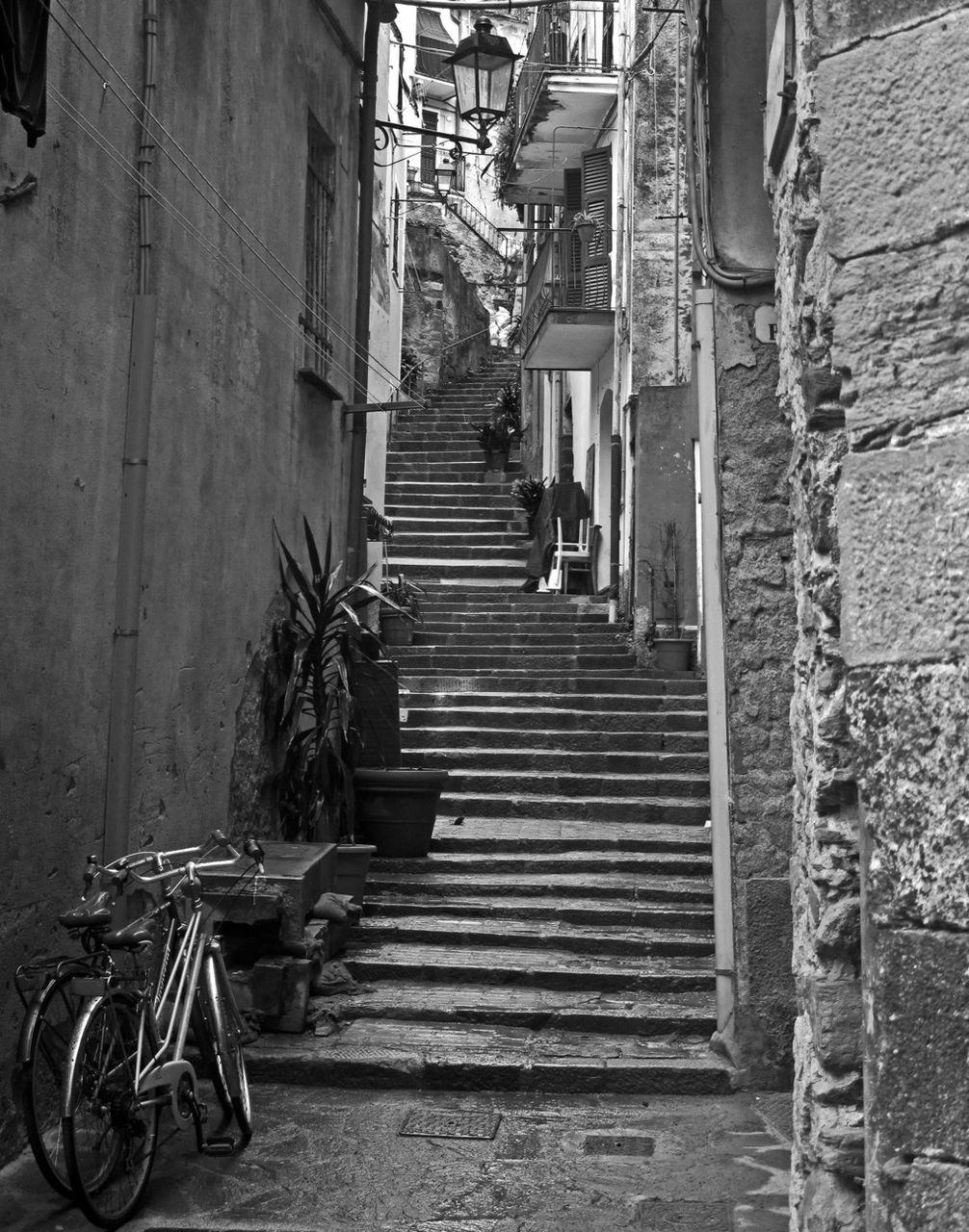 Bicycle on steps in city
