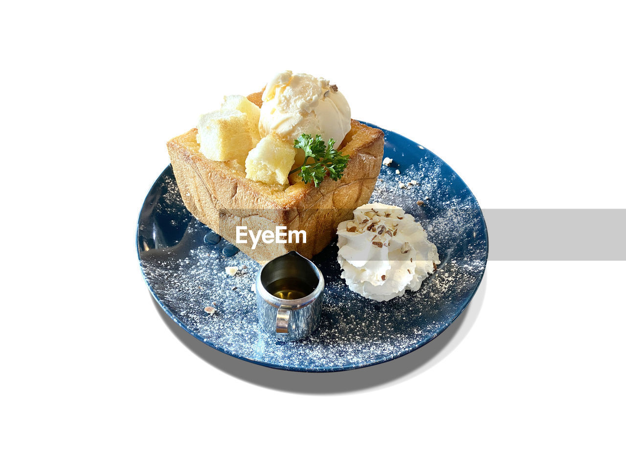 CLOSE-UP OF ICE CREAM SERVED ON PLATE