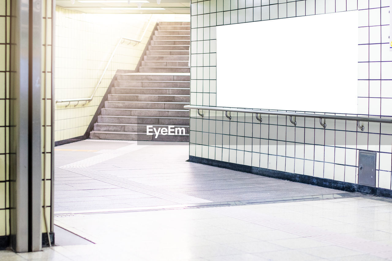 Blank billboard at subway station 