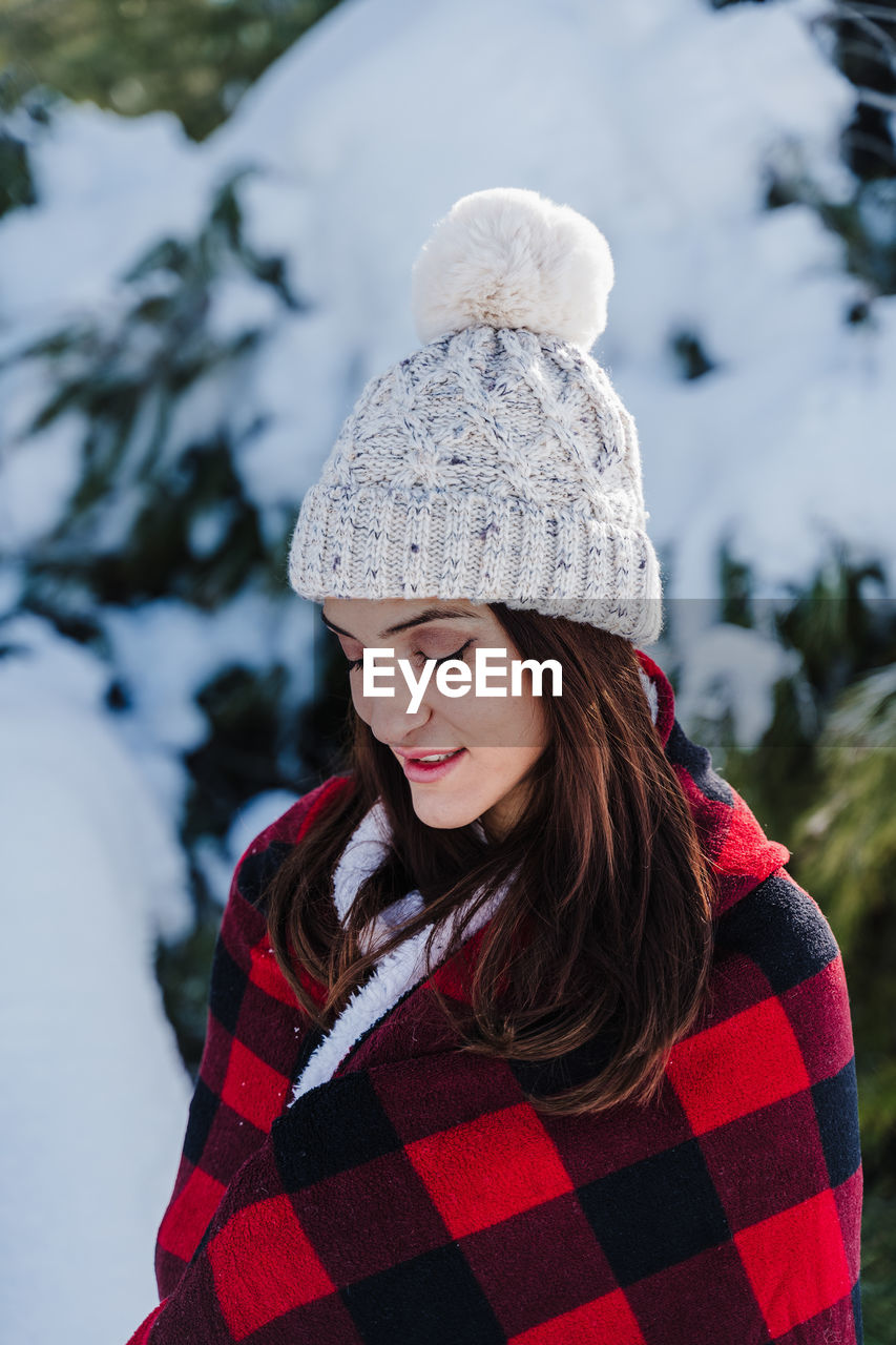 Young woman in snow during winter