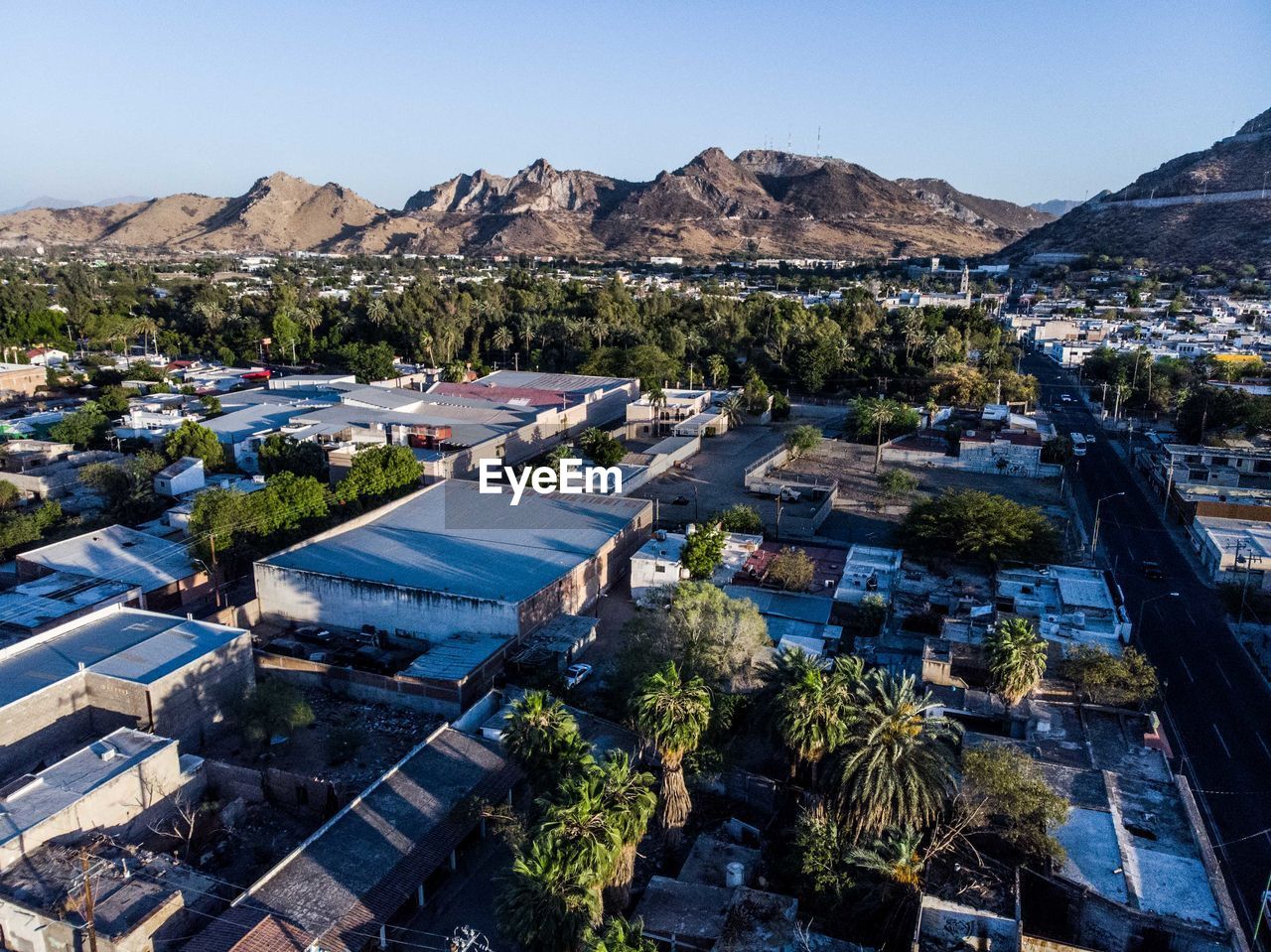 High angle view of buildings in city against sky