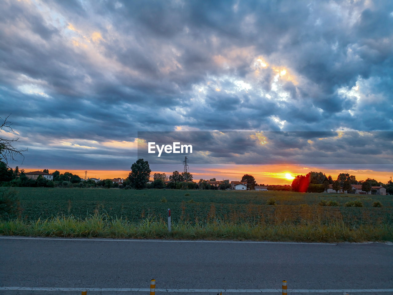 SCENIC VIEW OF SUNSET OVER LAND
