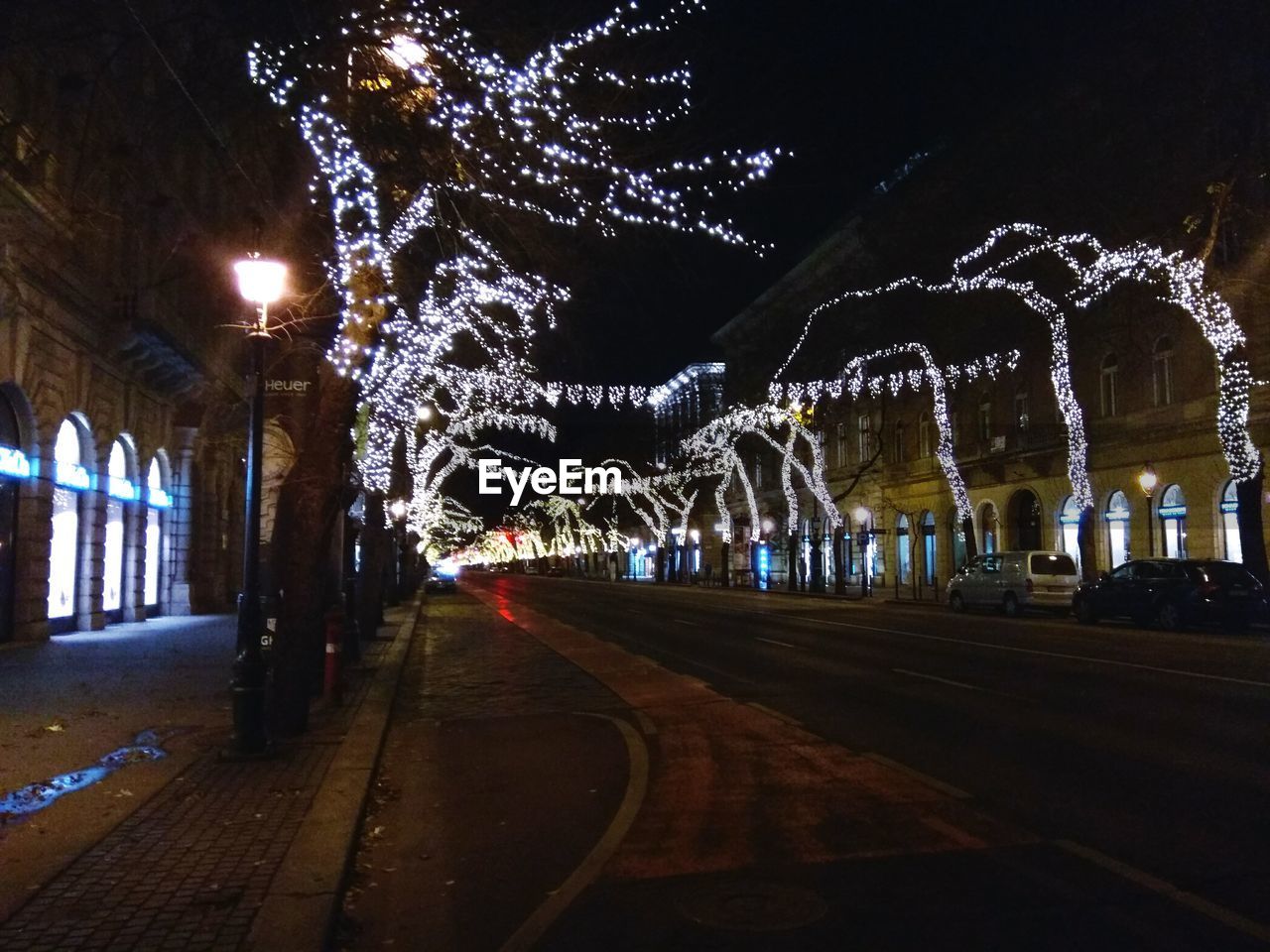 ILLUMINATED ROAD AT NIGHT