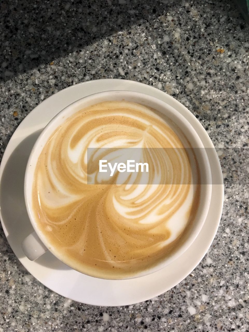 HIGH ANGLE VIEW OF COFFEE ON TABLE