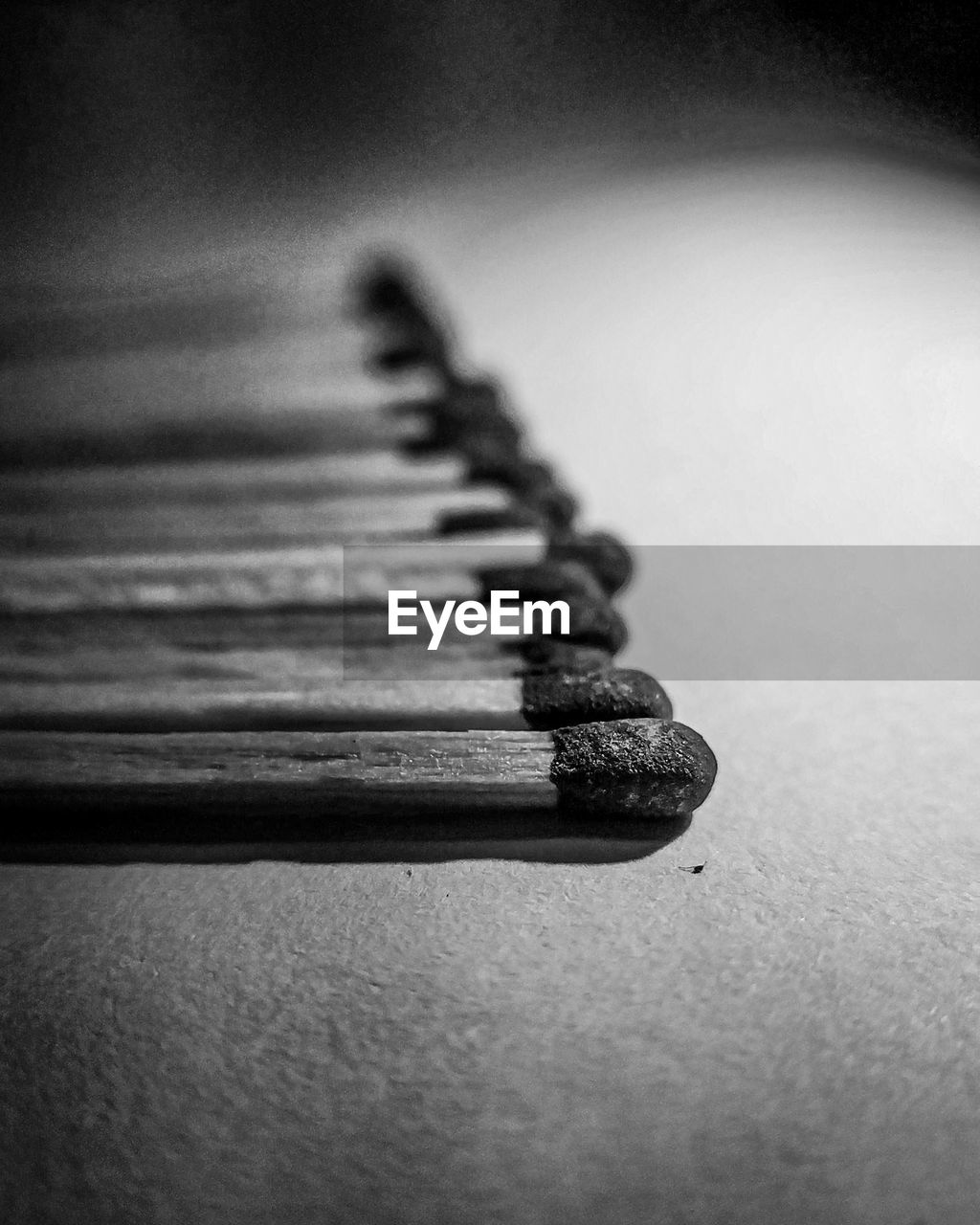 Close-up of matchsticks on table