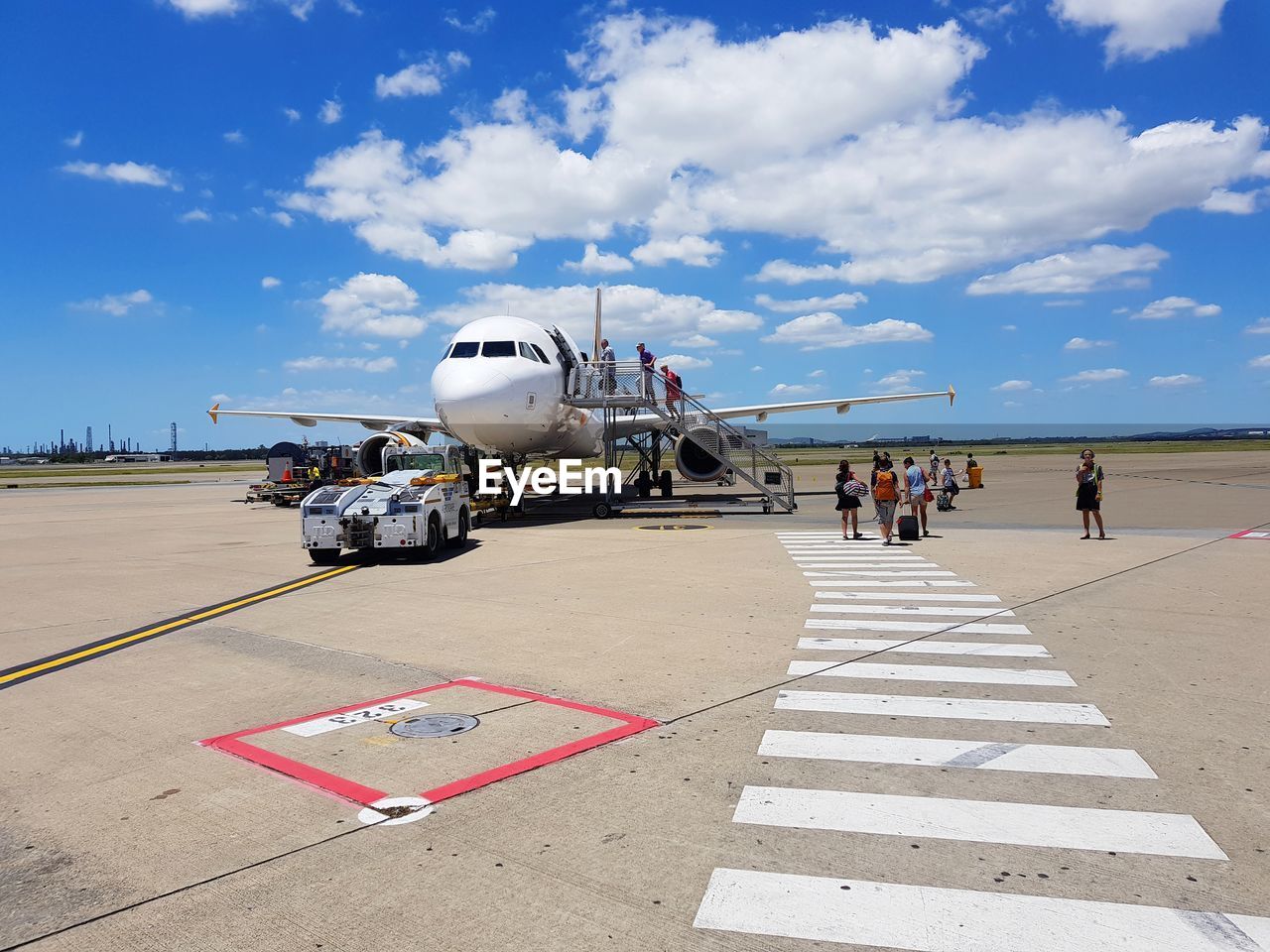 People at airport runway 