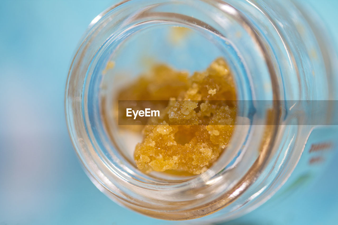 Close-up of cannabis wax in mason jar on table