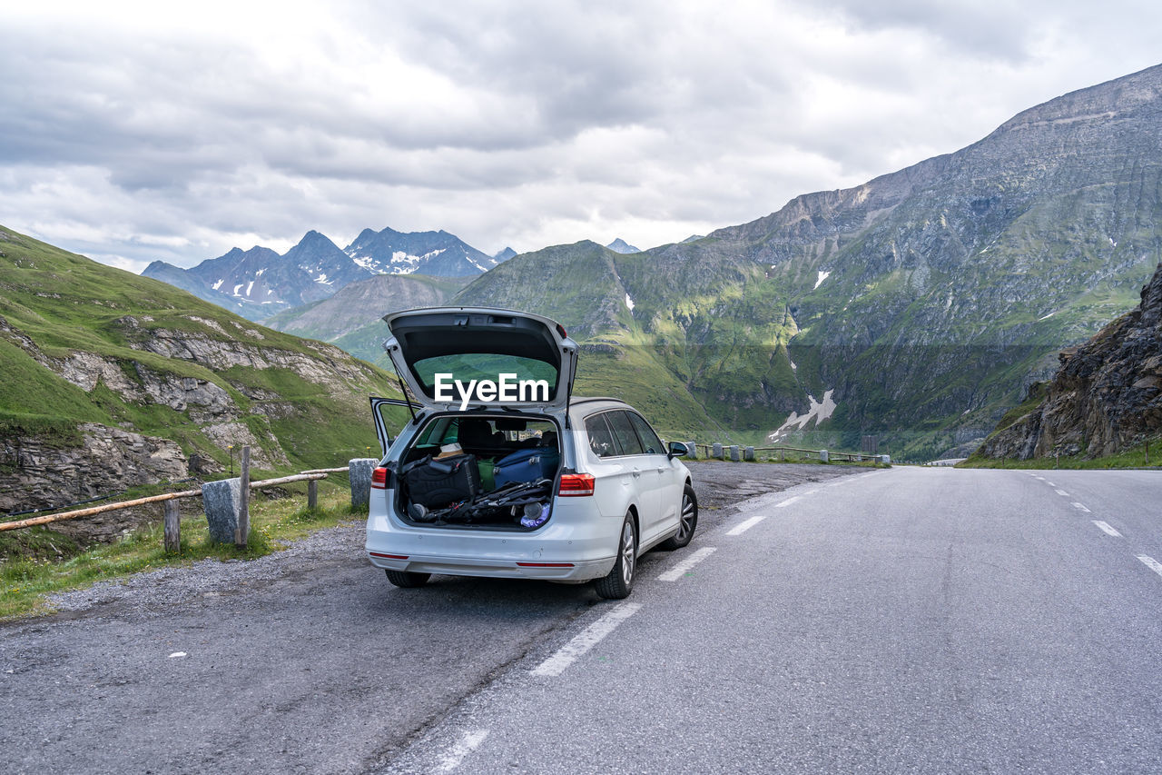 Car on road against mountain range