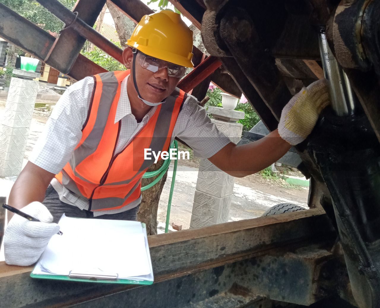 Engineer inspecting truck