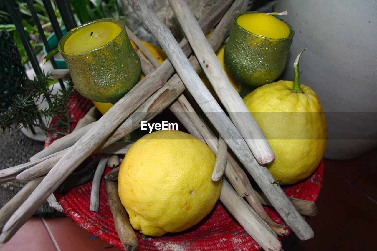 CLOSE-UP OF FRUITS IN BASKET