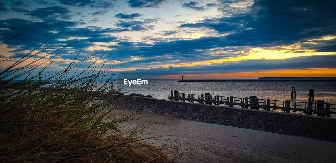 SCENIC VIEW OF SEA DURING SUNSET