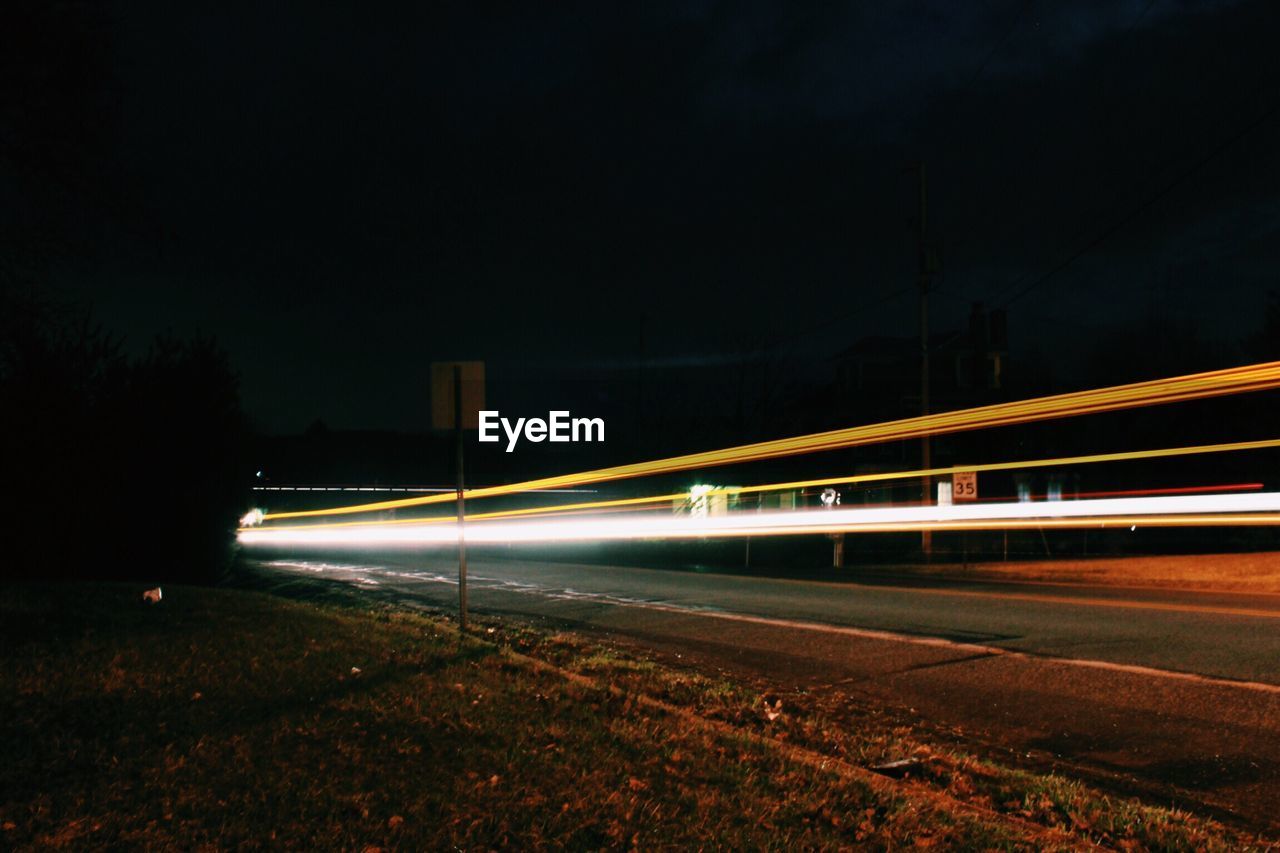 LIGHT TRAILS IN DARK ROOM
