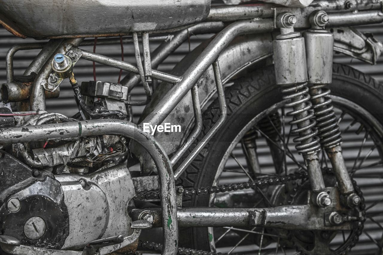 Close-up of rusty old motorcycle