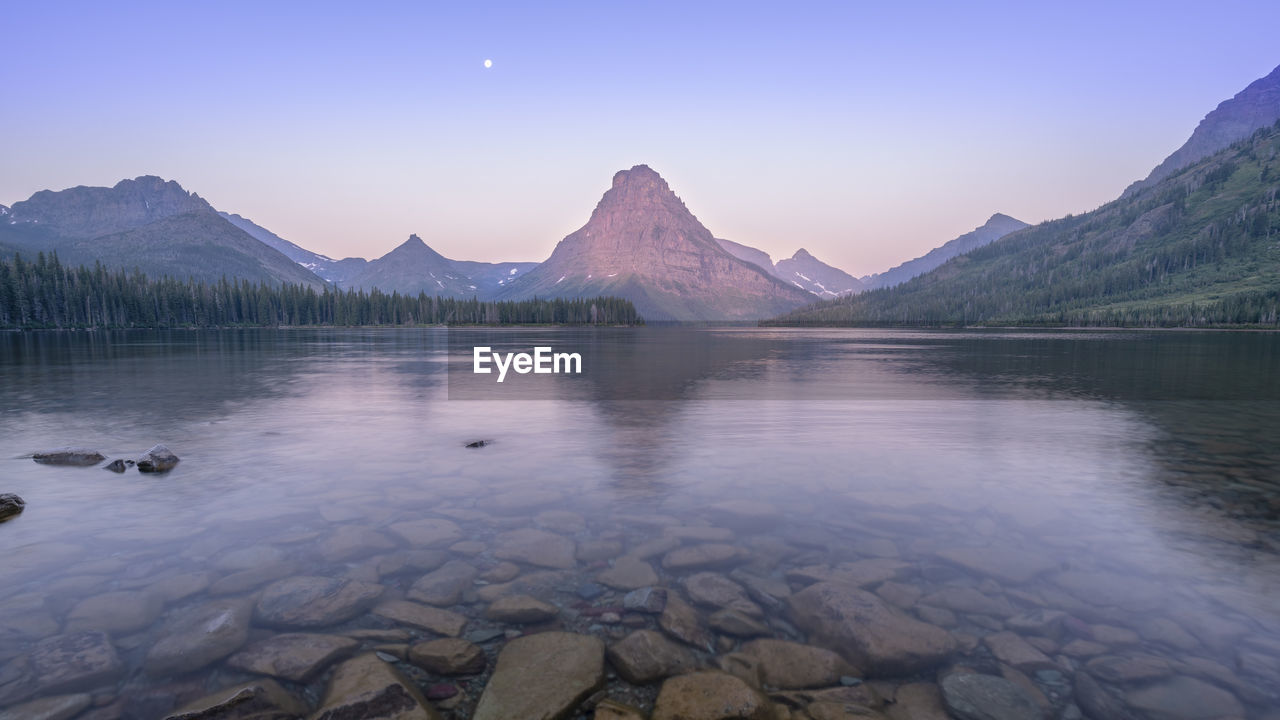 Sunrise from two medicine lake in glacier national park