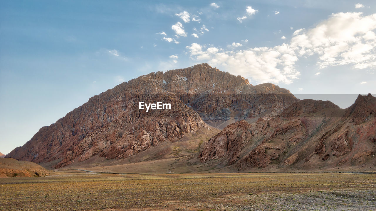 Scenic view of rocky mountains against sky