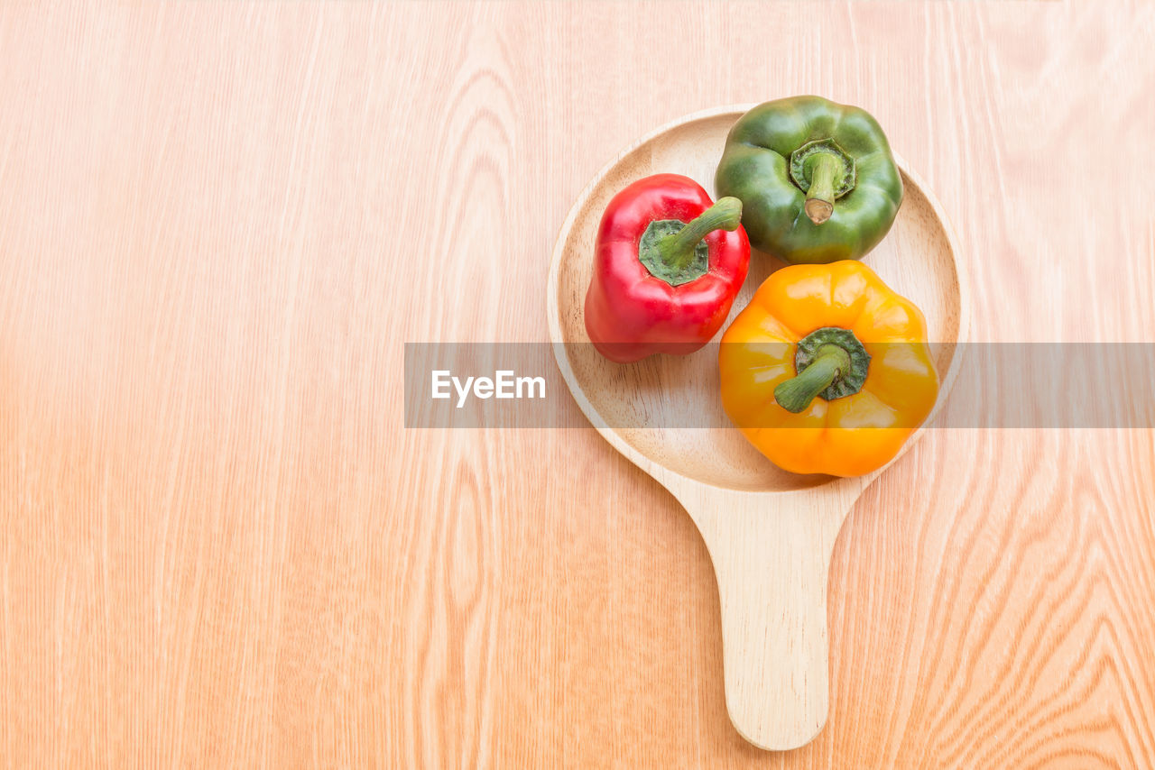 High angle view of bell peppers on cutting board