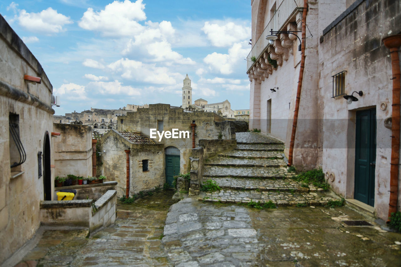 A street in the old town of matera, a city in italy declared a unesco heritage site.