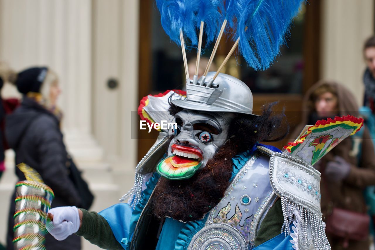 Close-up of person wearing mask and costume