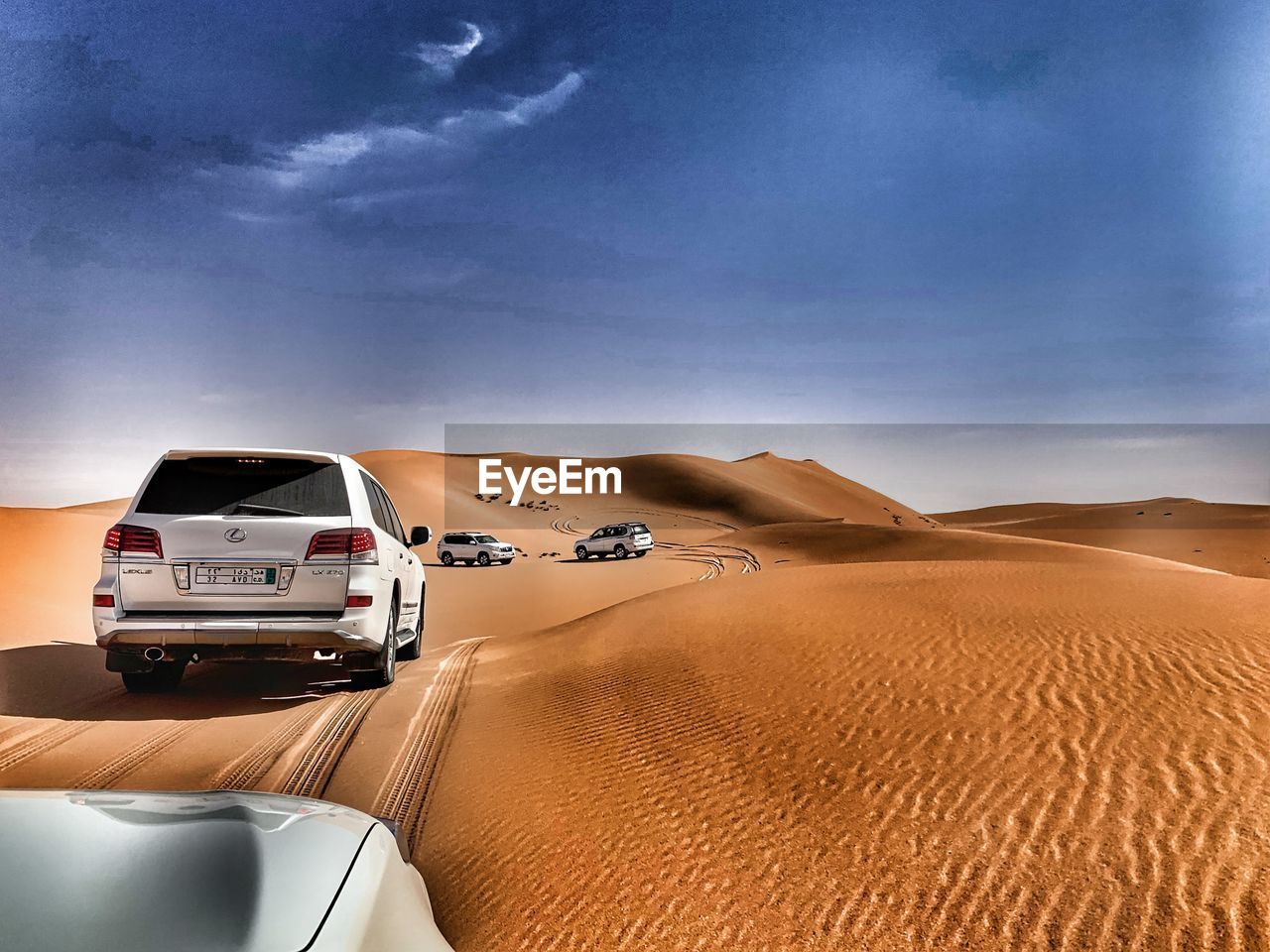 VIEW OF DESERT ROAD AGAINST SKY