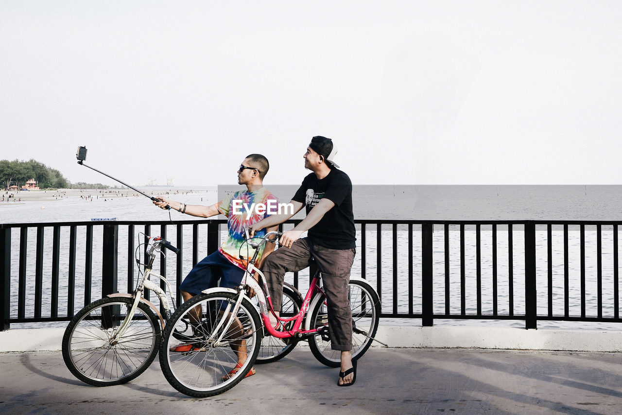 YOUNG COUPLE ON BICYCLE