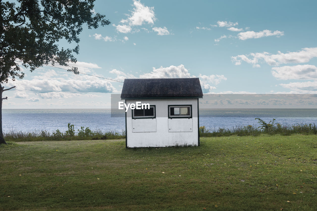 A old, but still used cottage outbuilding bunky on the shores of lake erie.