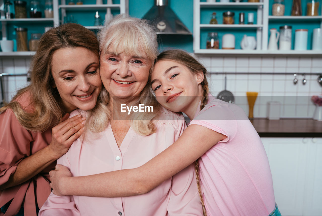 Portrait of cheerful family at home