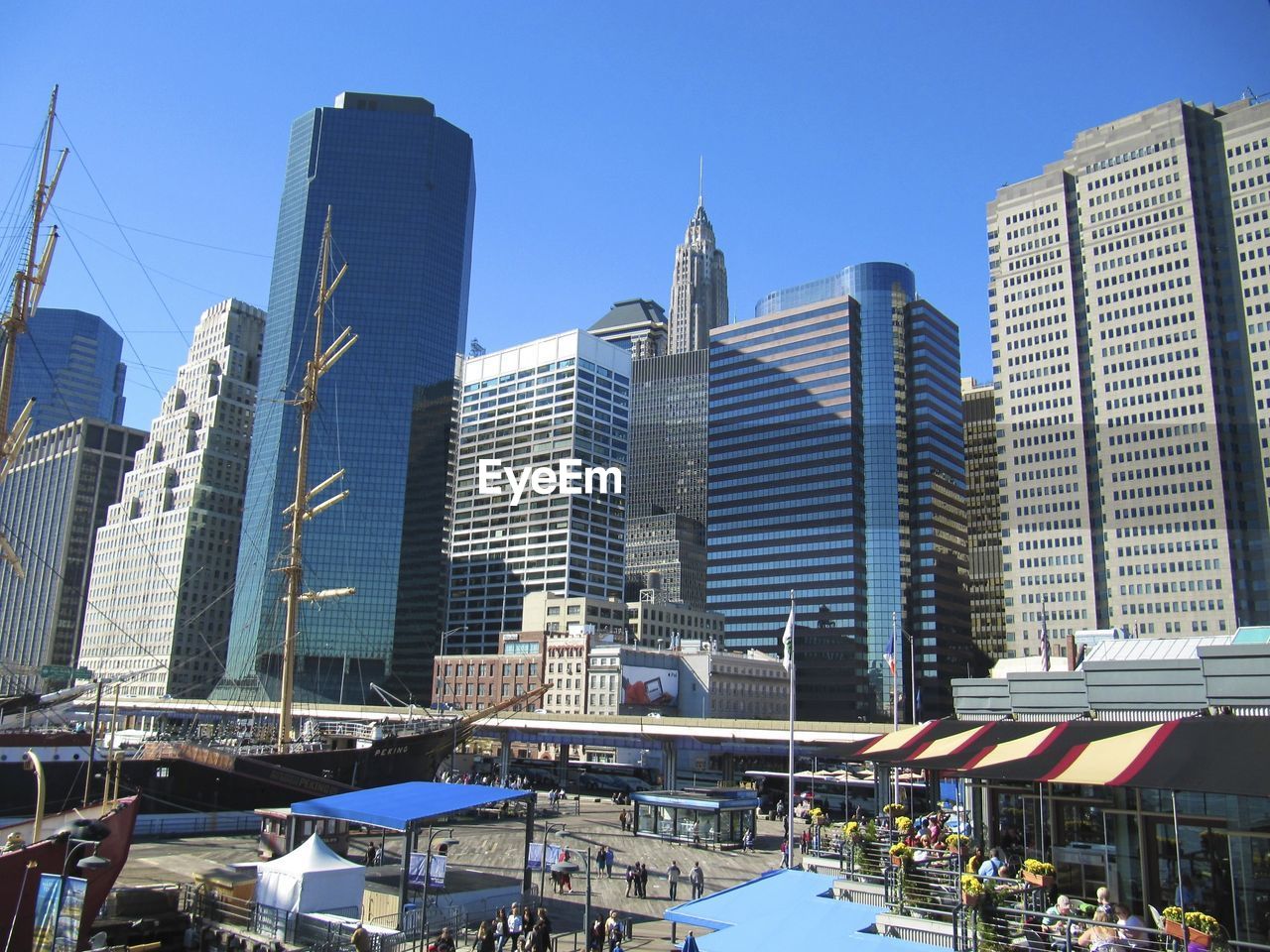 Low angle view of modern building against blue sky